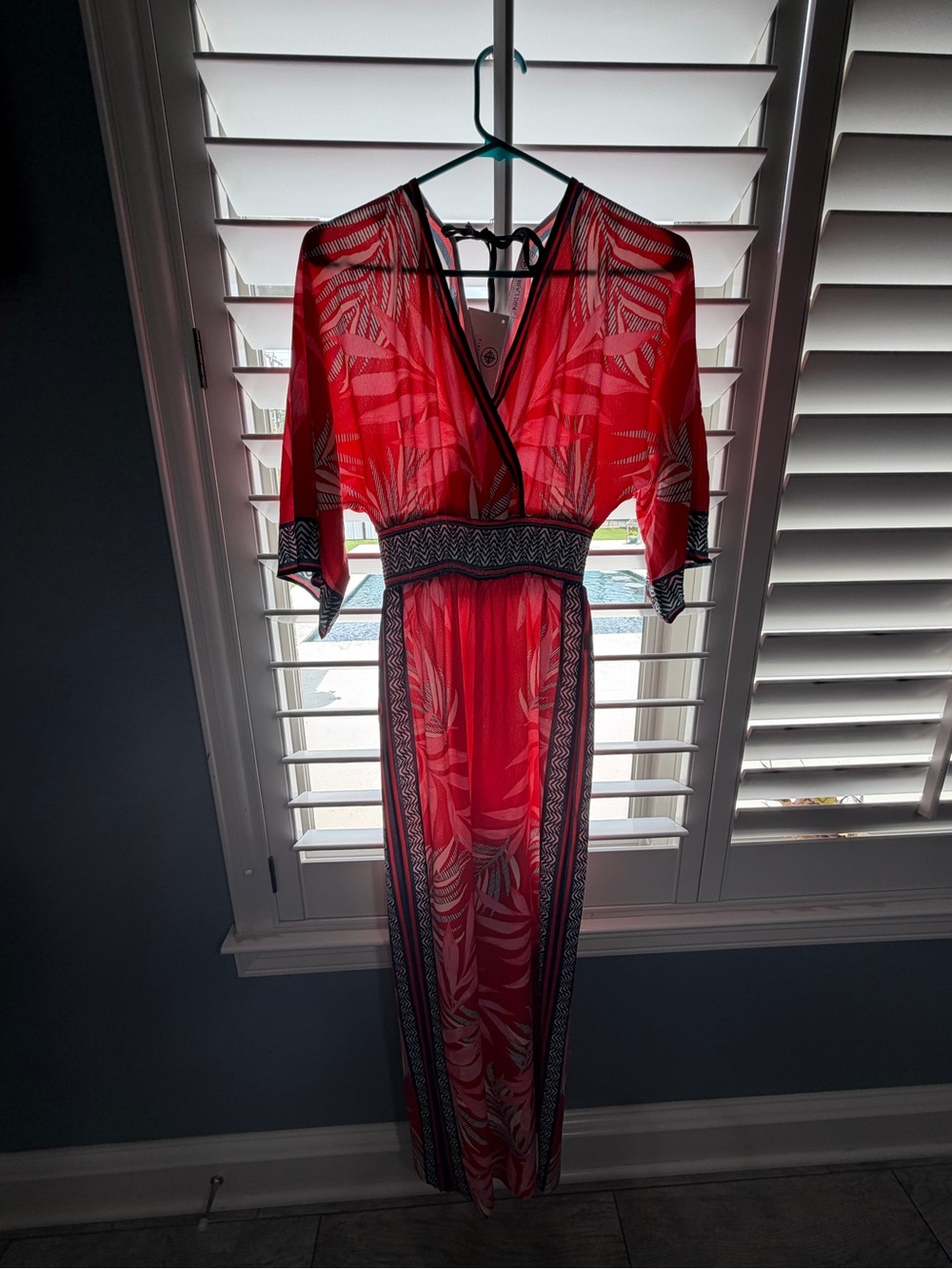 Red Tropical Print Romper with Contrasting Trim